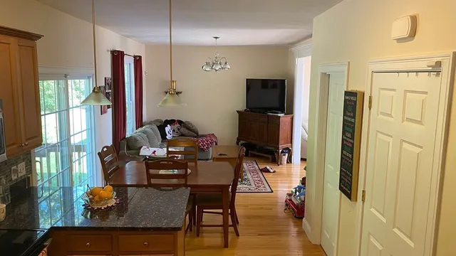 a kitchen with a sink stove and refrigerator