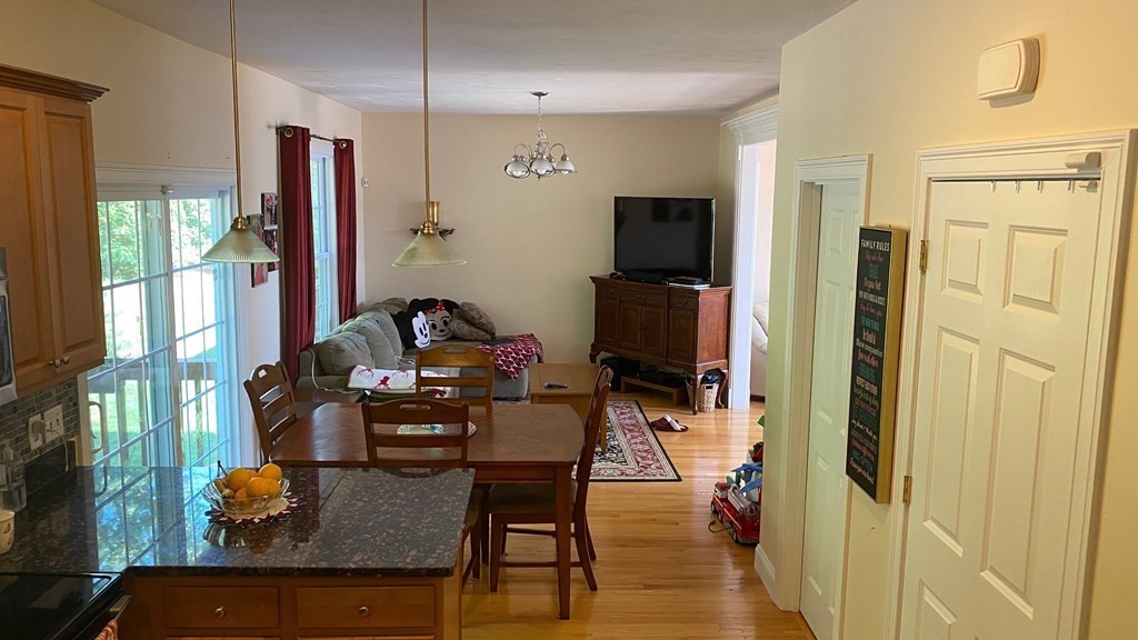 73 Zain Circle, Unit 73 Milford, MA 01757 - Photo 14 of 16 a view of a workspace with furniture and a window