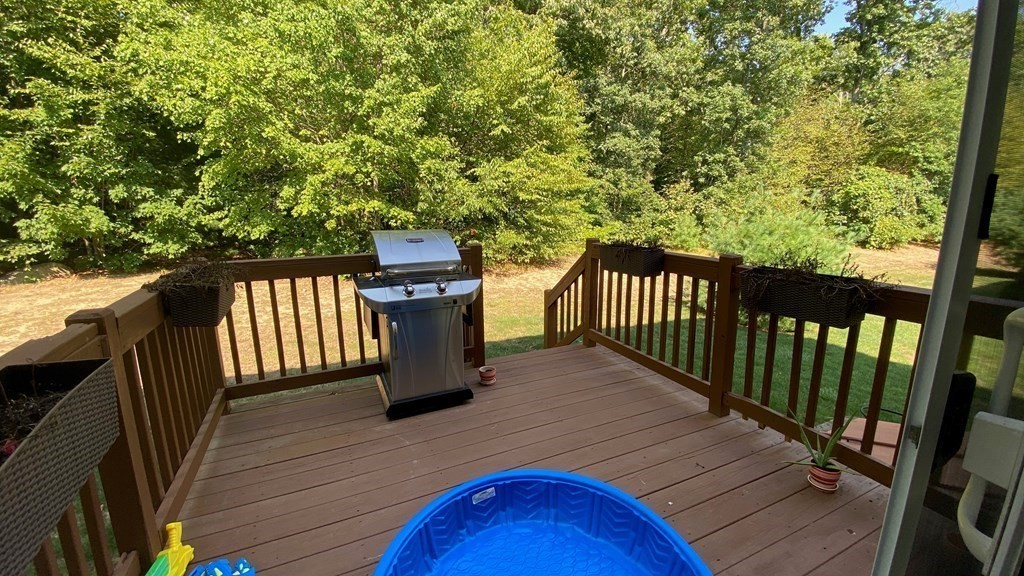 73 Zain Circle, Unit 73 Milford, MA 01757 - Photo 2 of 16 a view of deck with patio