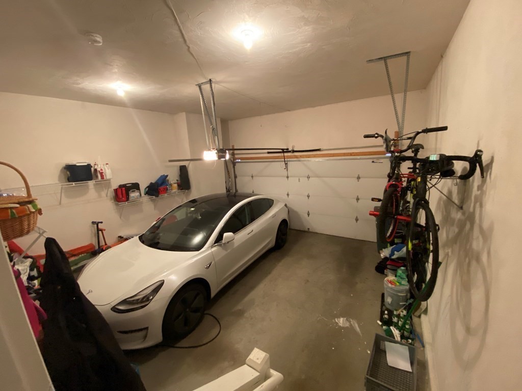 73 Zain Circle, Unit 73 Milford, MA 01757 - Photo 3 of 16 a view of a room with gym equipment