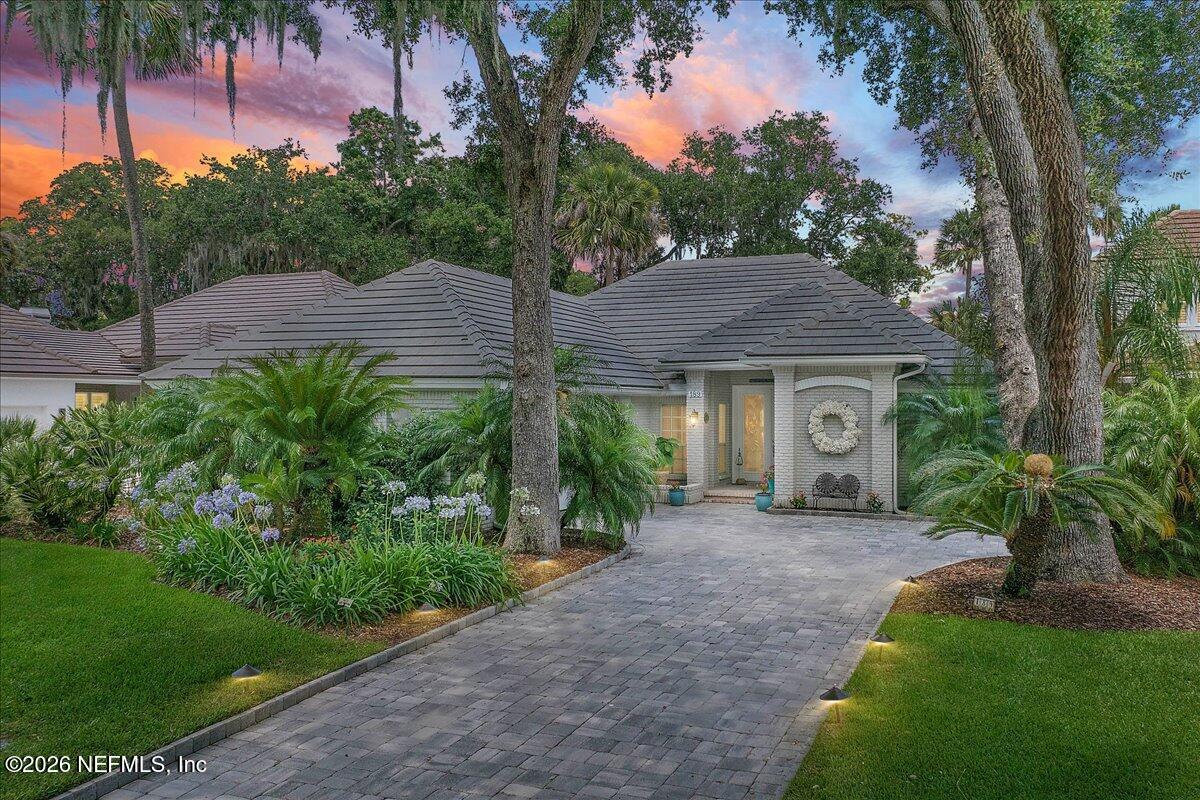 189 Laurel Lane Ponte Vedra Beach, FL 32082 - Photo 1 of 31 a front view of a house with a garden