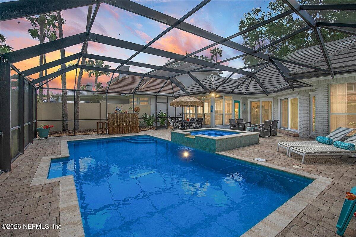 189 Laurel Lane Ponte Vedra Beach, FL 32082 - Photo 16 of 31 a view of a swimming pool with a patio