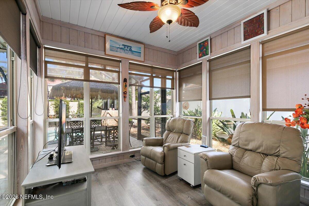 189 Laurel Lane Ponte Vedra Beach, FL 32082 - Photo 18 of 31 a living room with furniture ceiling fan and a large window