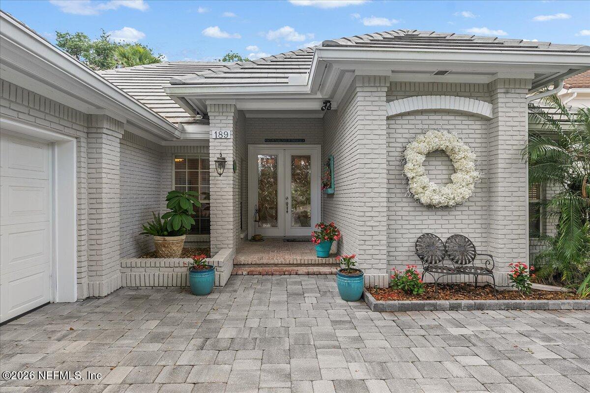 189 Laurel Lane Ponte Vedra Beach, FL 32082 - Photo 2 of 31 a front view of a house with entryway