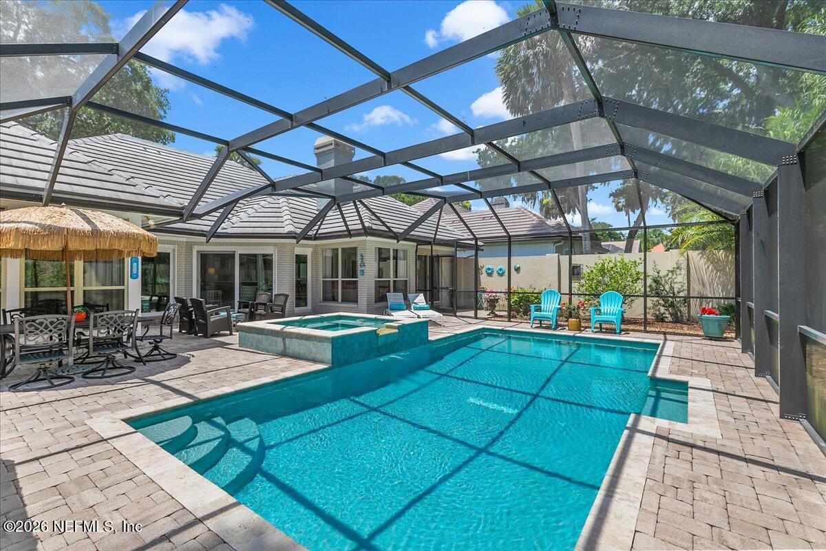 189 Laurel Lane Ponte Vedra Beach, FL 32082 - Photo 6 of 31 a view of swimming pool with outdoor seating