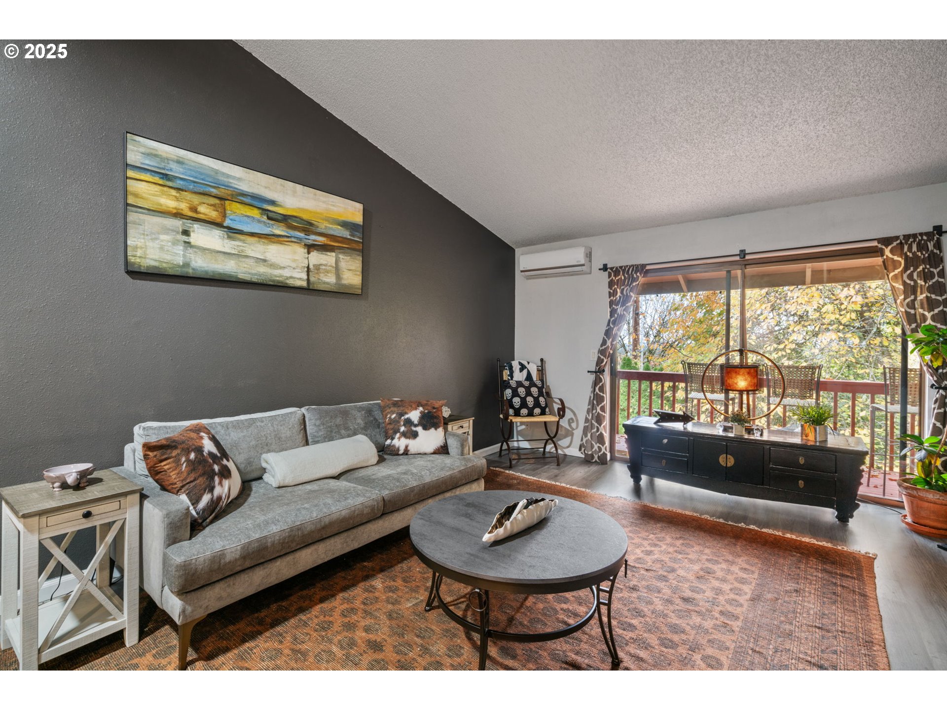 2818 Tree Top Lane West Linn, OR 97068 - Photo 13 of 46 a living room with furniture and a large window