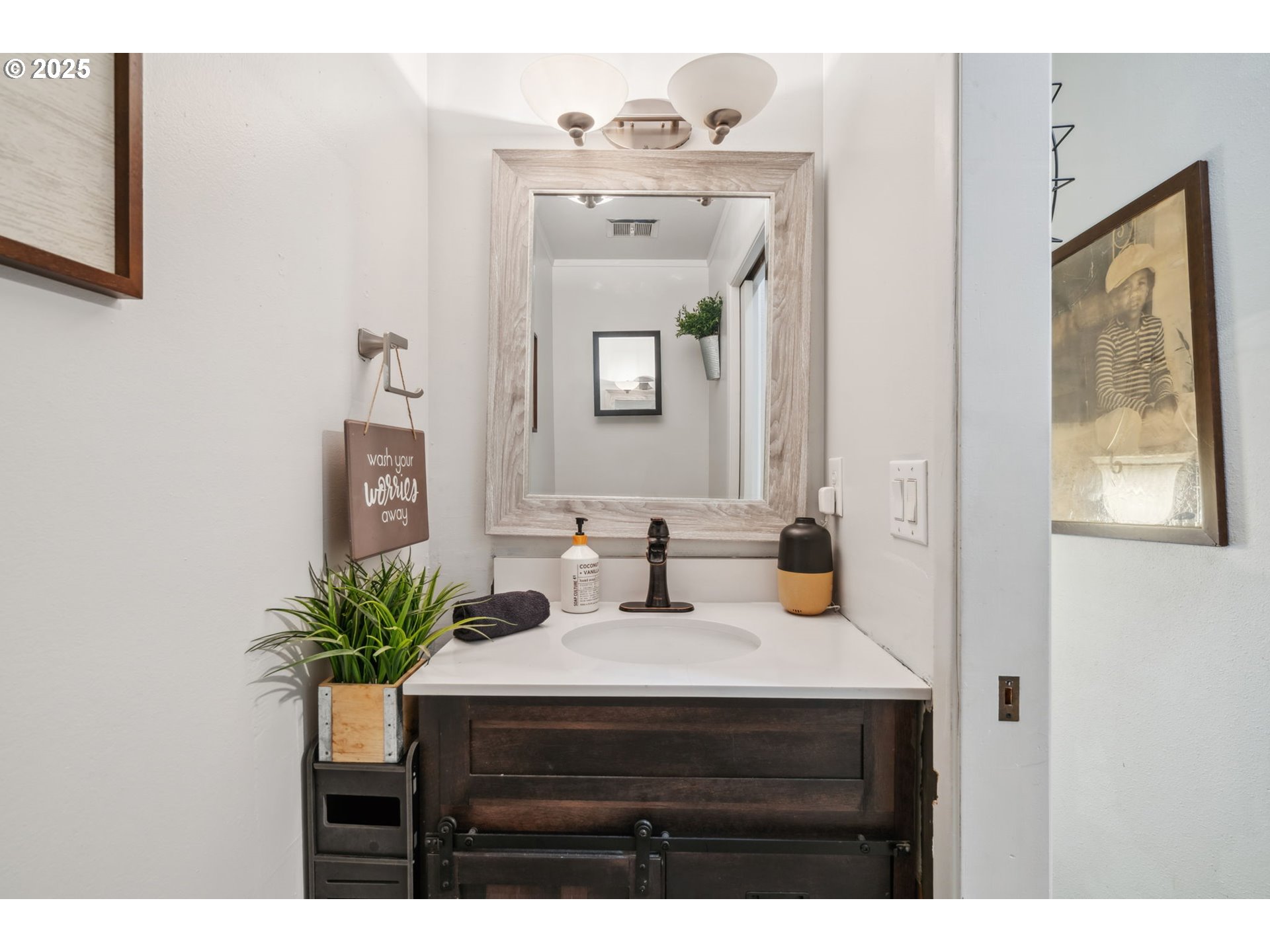 2818 Tree Top Lane West Linn, OR 97068 - Photo 20 of 46 a bathroom with a sink vanity and a mirror