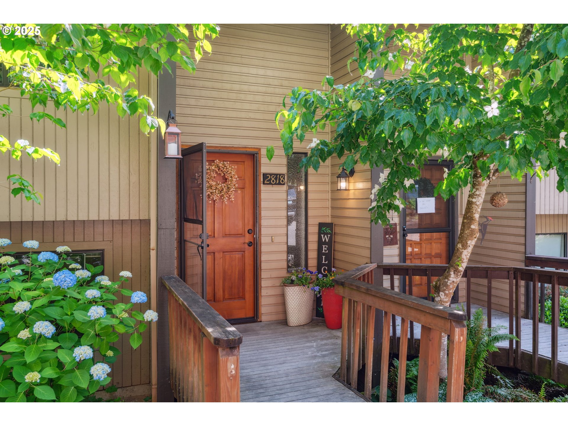 2818 Tree Top Lane West Linn, OR 97068 - Photo 2 of 46 a backyard of a house with lots of green space