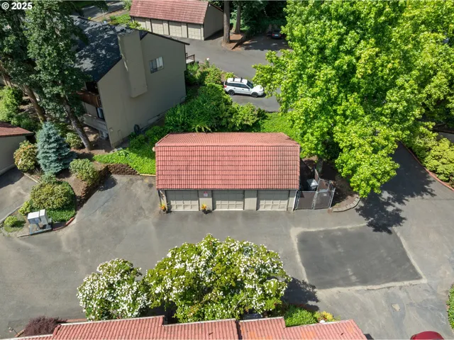 an outdoor sitting area with a table and chair
