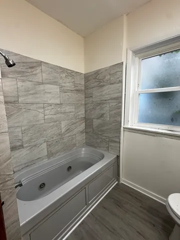 a bathroom with a bathtub