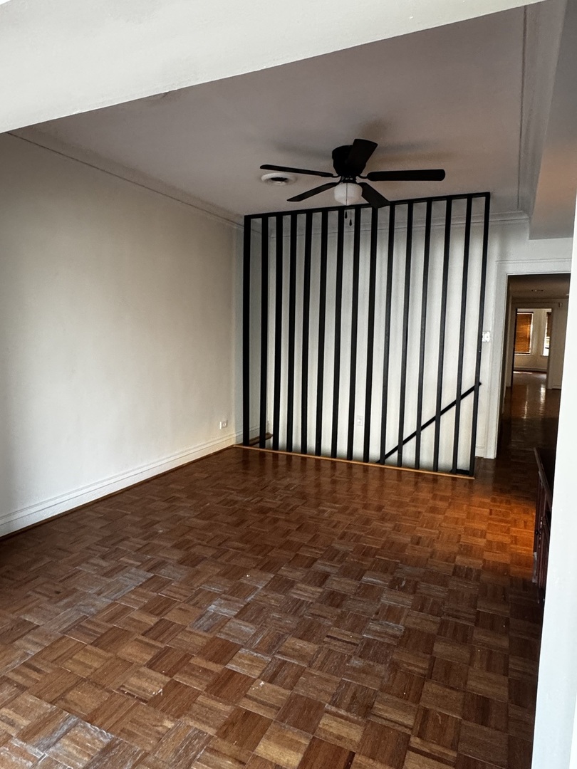 6937 South Merrill Avenue, Unit 1 Chicago, IL 60649 - Photo 9 of 17 a view of an empty room