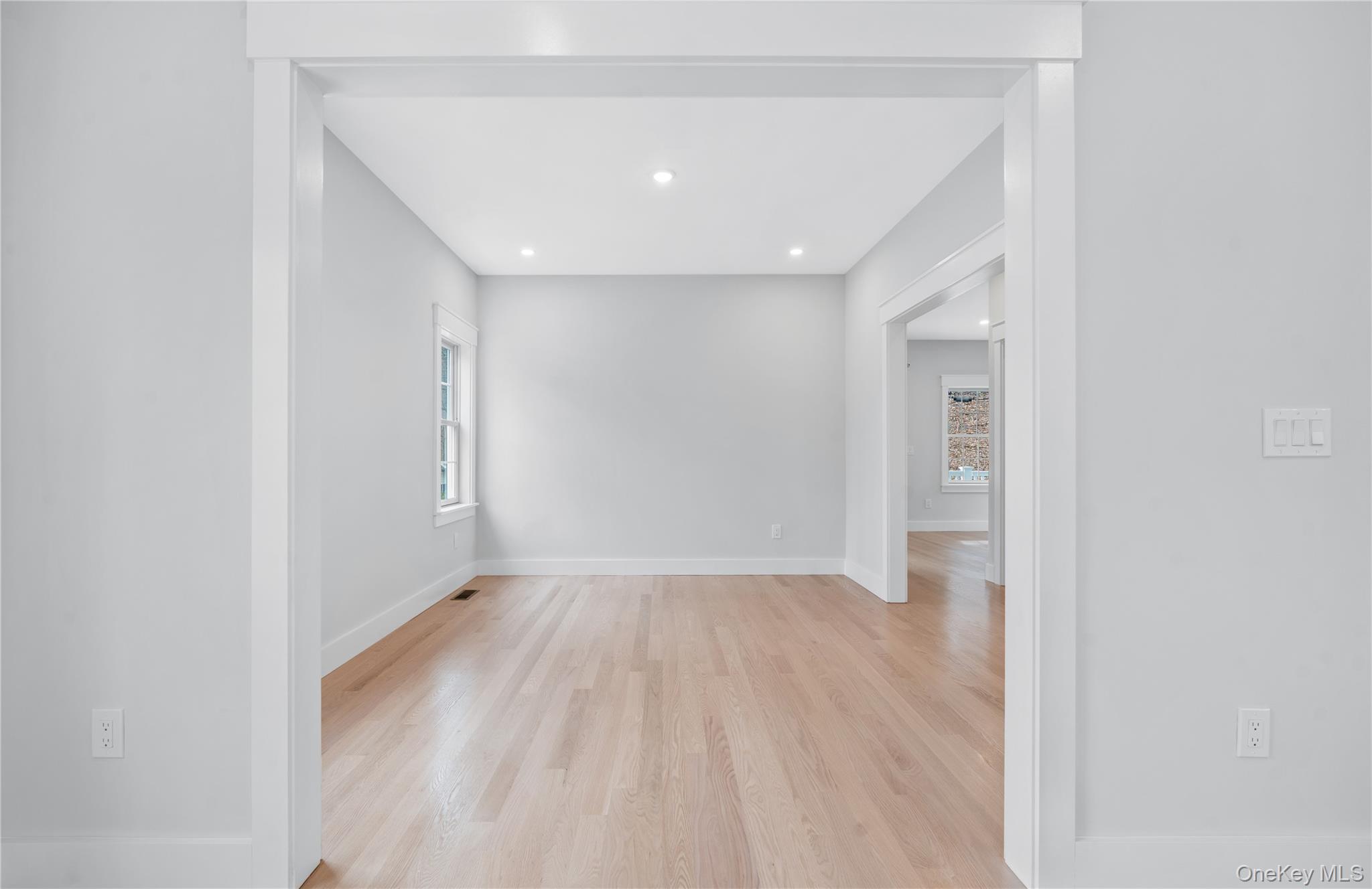 16 Stephens Lane Valhalla, NY 10595 - Photo 11 of 47 a view of an empty room with wooden floor