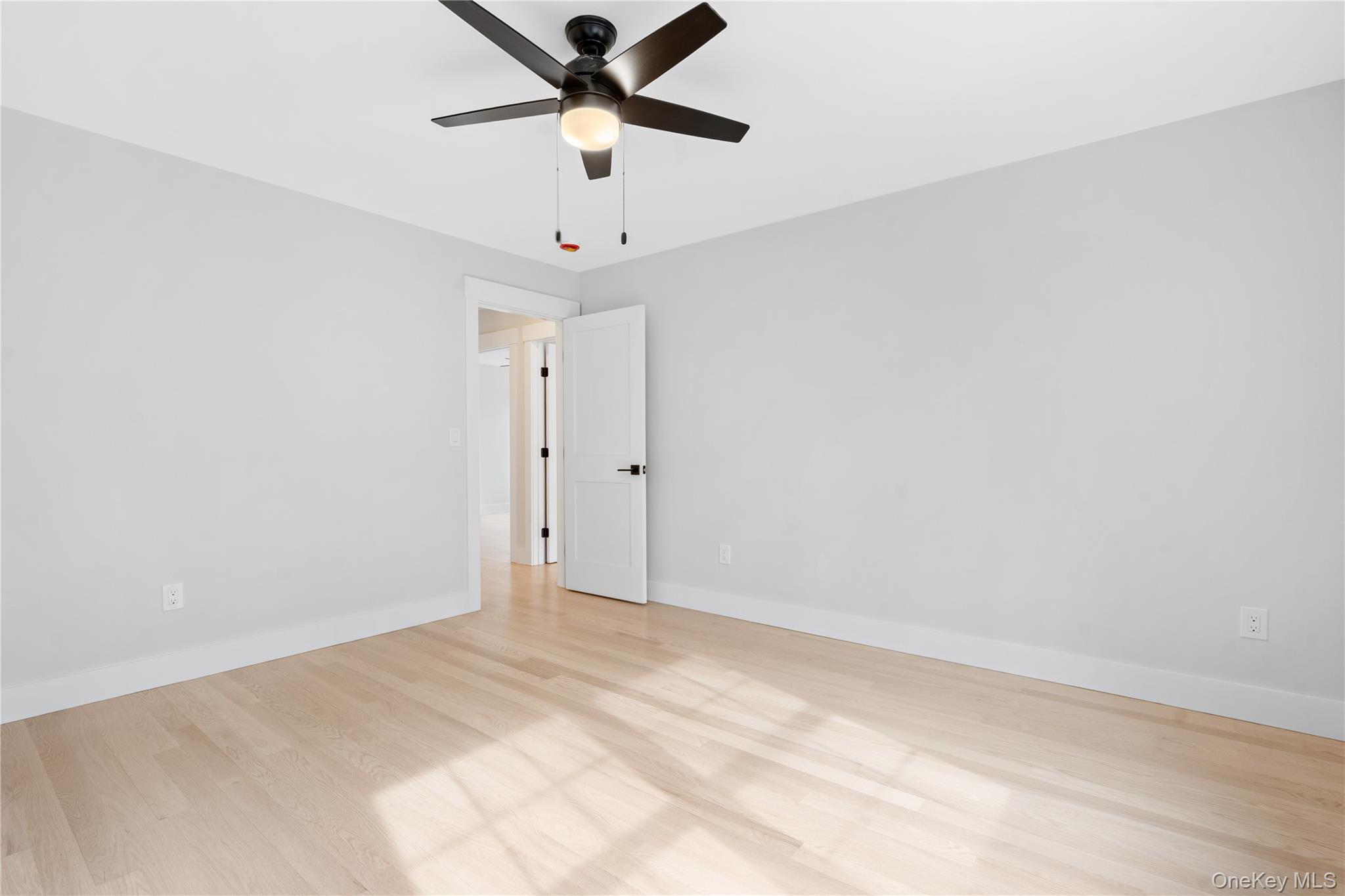 16 Stephens Lane Valhalla, NY 10595 - Photo 24 of 47 an empty room with a window and a fan