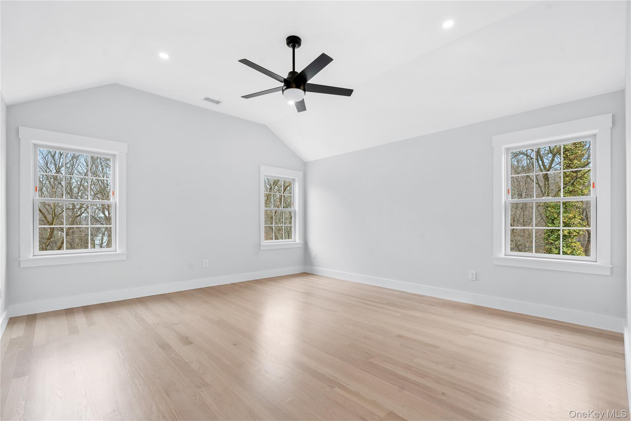 16 Stephens Lane Valhalla, NY 10595 - Photo 31 of 47 a view of empty room with wooden floor and fan