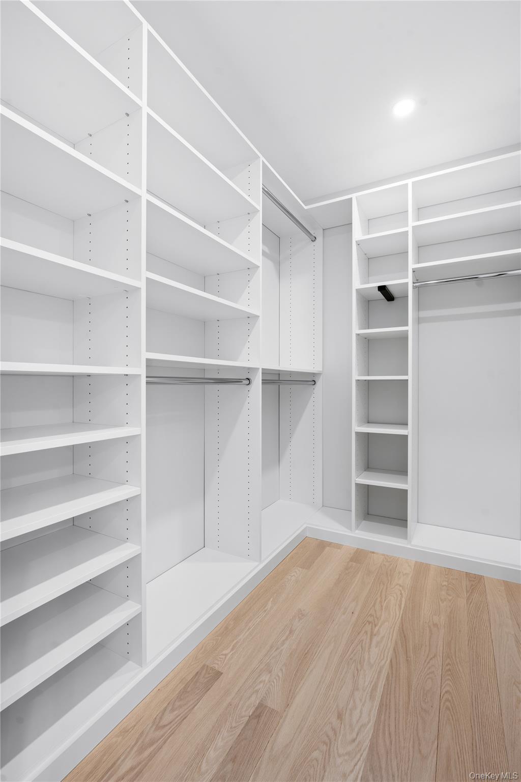 16 Stephens Lane Valhalla, NY 10595 - Photo 34 of 47 a view of walk in closet with empty racks