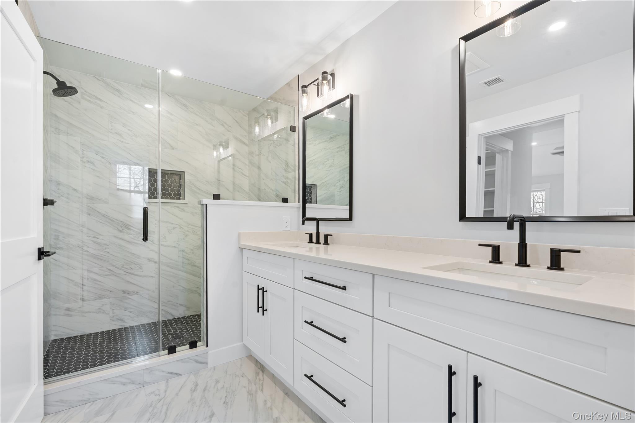 16 Stephens Lane Valhalla, NY 10595 - Photo 36 of 47 a bathroom with a double vanity sink mirror and