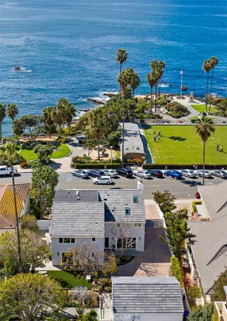 a spacious bathroom with a shower and a sink