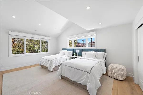 a view of a house with swimming pool and a yard