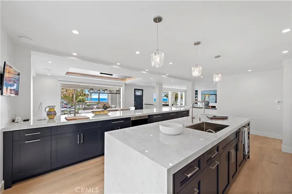 a swimming pool with outdoor seating and garden