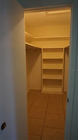 a bathroom with a shower and a toilet