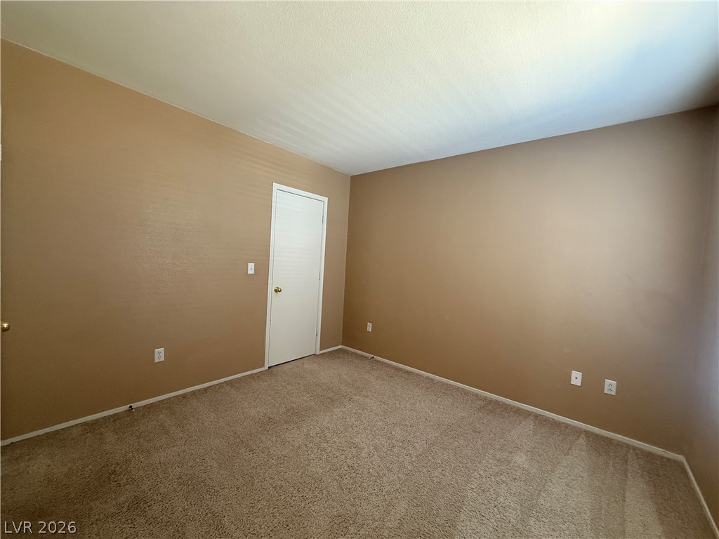 7255 West Sunset Road, Unit 2052 Las Vegas, NV 89113 - Photo 13 of 16 An inviting room awaits personalization, offering a fresh canvas for your creative touch.