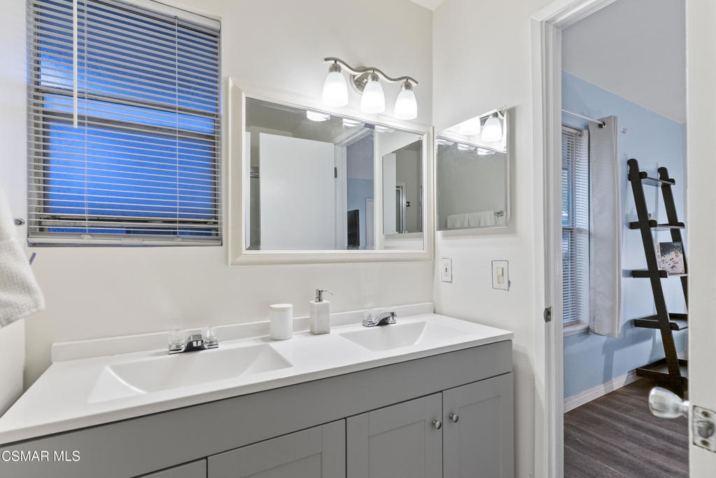 2324 Miramar Walk Oxnard, CA 93035 - Photo 16 of 24 a bathroom with a sink and a mirror