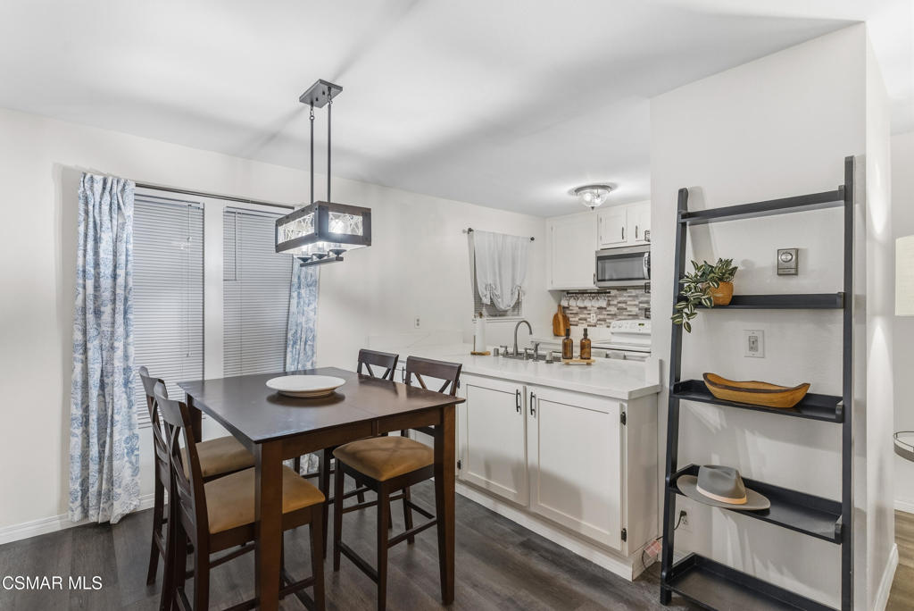 2324 Miramar Walk Oxnard, CA 93035 - Photo 10 of 24 a kitchen with a table and chairs in it