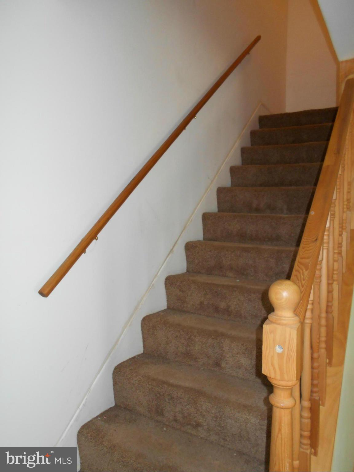 1724 Pin Oak Road Baltimore, MD 21234 - Photo 15 of 26 Staircase to Upper Level