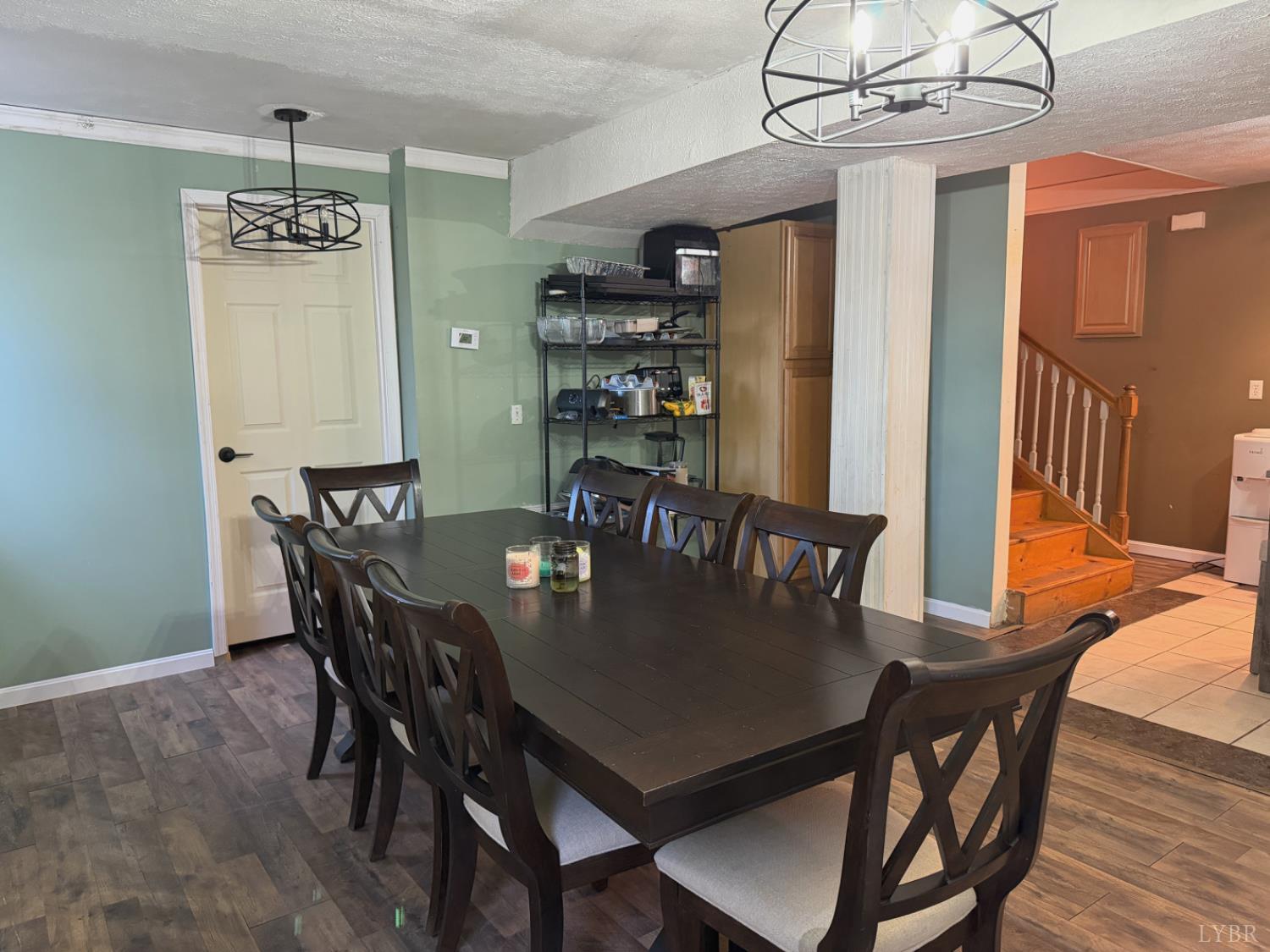 360 Theta Mill Road Gladys, VA 24554 - Photo 15 of 25 a view of a dining room with furniture and wooden floor