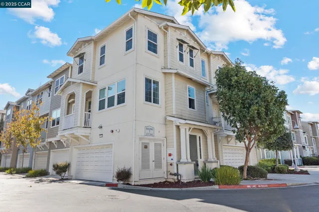 a front view of a building with a road