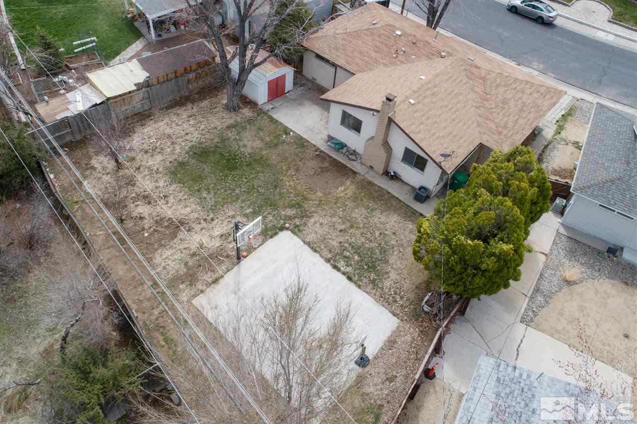 1010 Beldon Way Reno, NV 89503 - Photo 3 of 20 a view of a house with a backyard
