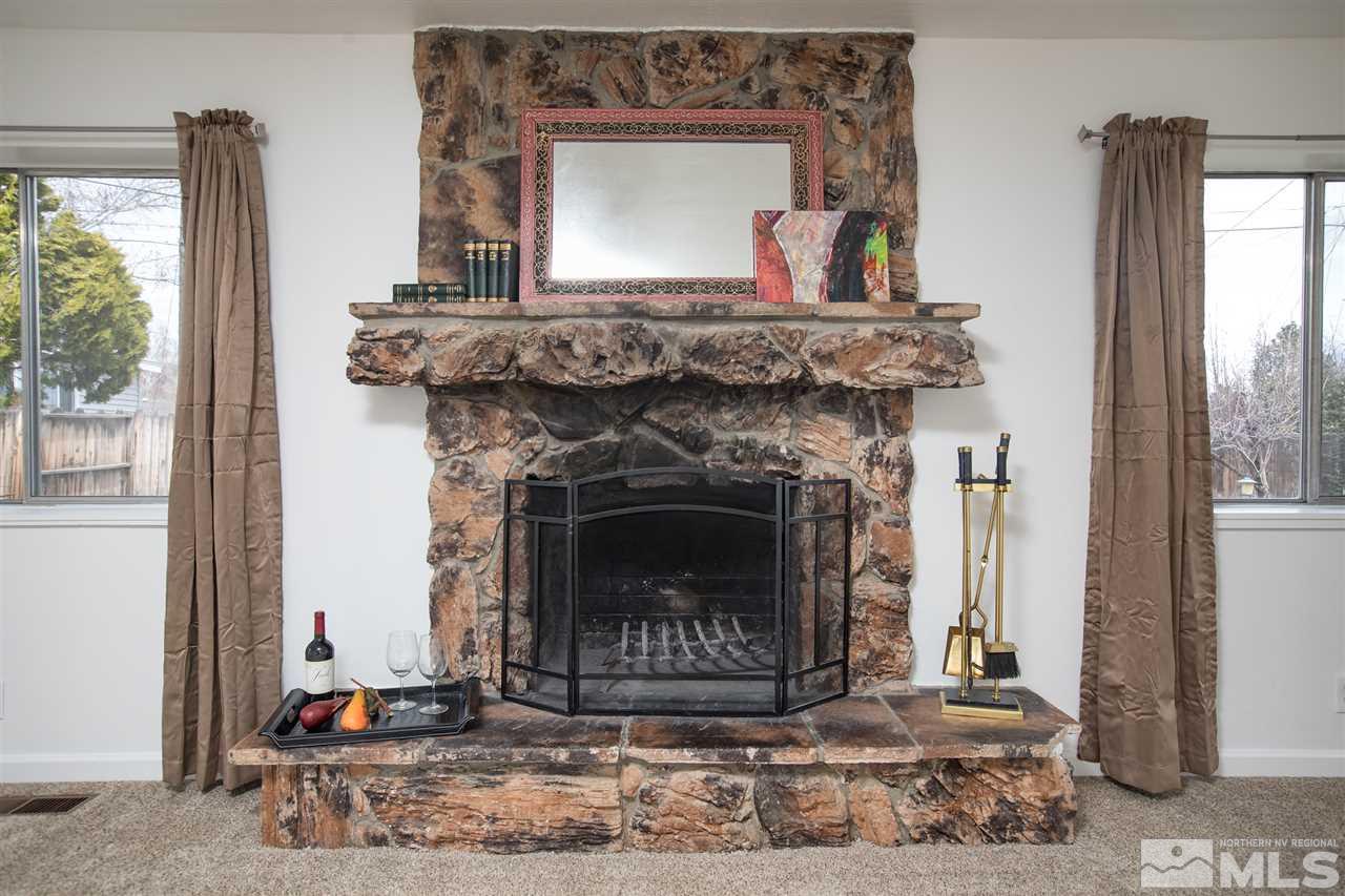 1010 Beldon Way Reno, NV 89503 - Photo 8 of 20 a living room with furniture and a fireplace