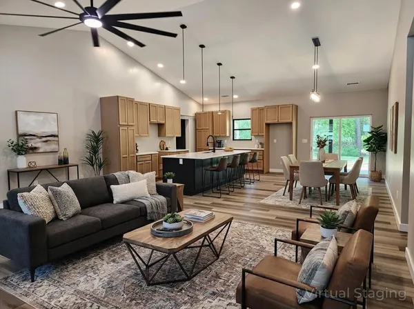 a bathroom with a sink a large mirror and vanity