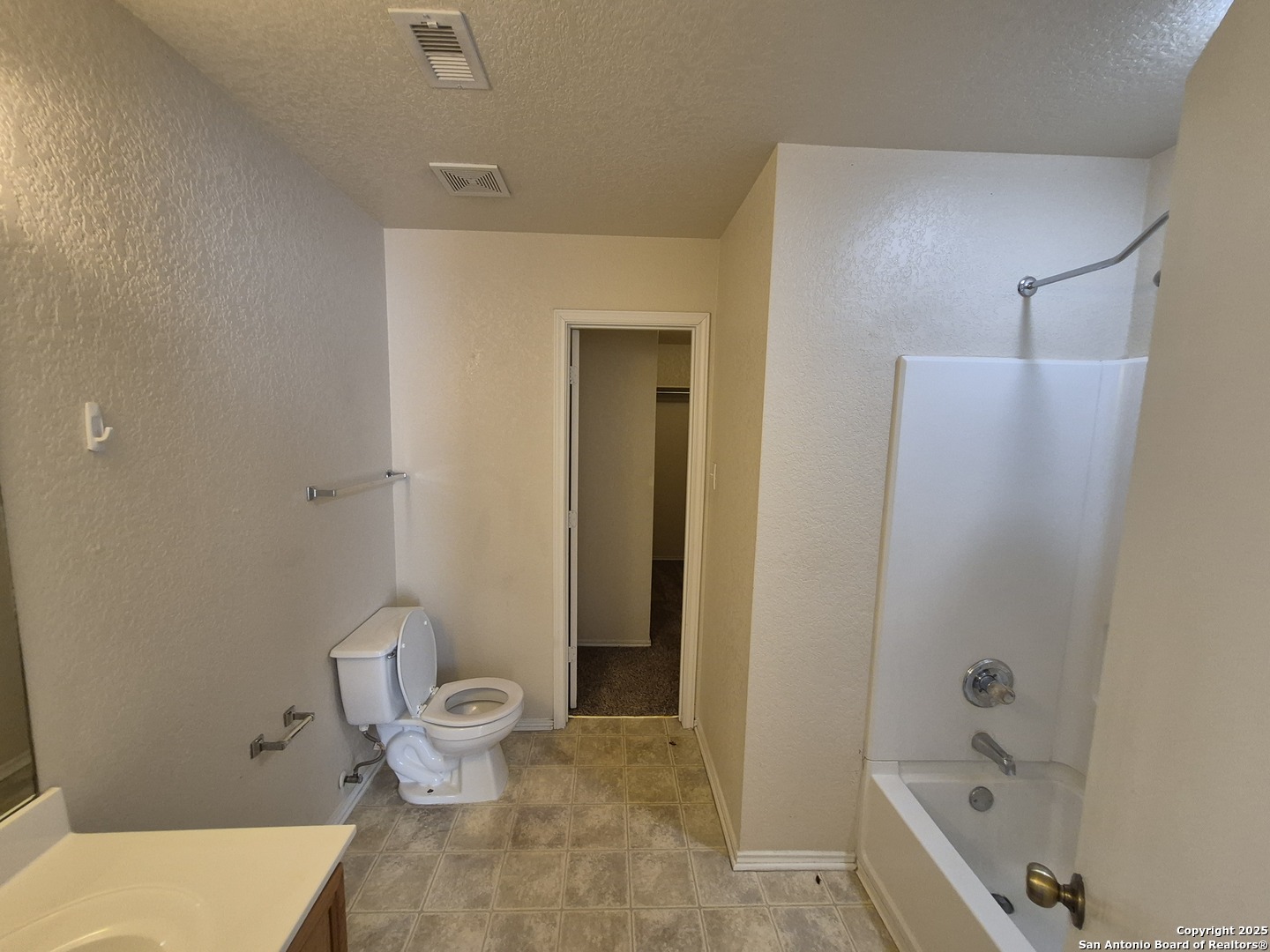 102 Kenrock Ridge San Antonio, TX 78254 - Photo 20 of 30 a bathroom with a sink a toilet and shower