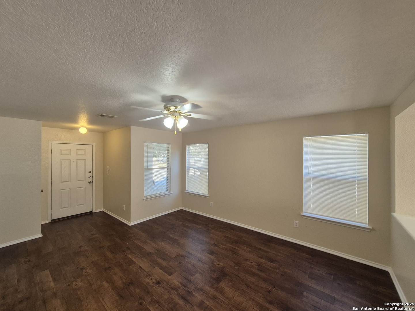 102 Kenrock Ridge San Antonio, TX 78254 - Photo 4 of 30 a view of an empty room with a window