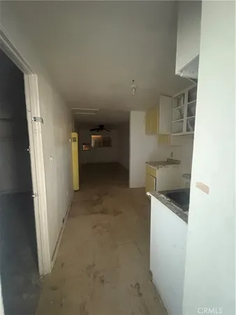 a view of storage and utility room with washer and dryer