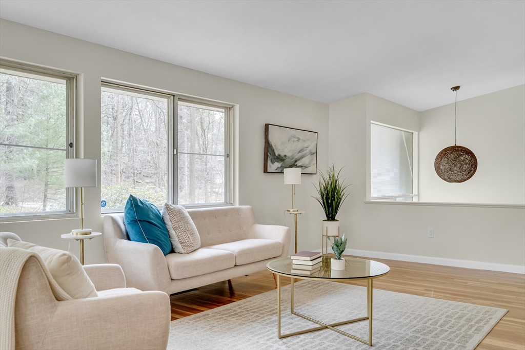 22 Partridge Road Lexington, MA 02420 - Photo 11 of 42 a living room with furniture a window and a table