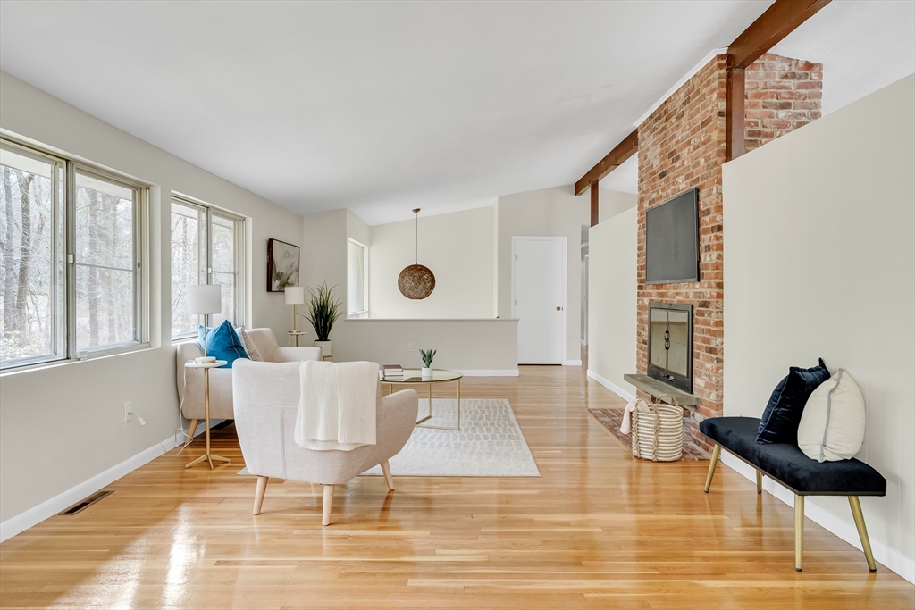 22 Partridge Road Lexington, MA 02420 - Photo 13 of 42 a living room with furniture a window and wooden floor