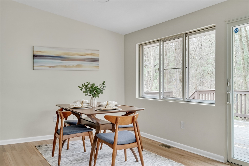 22 Partridge Road Lexington, MA 02420 - Photo 20 of 42 a dining room with furniture and wooden floor