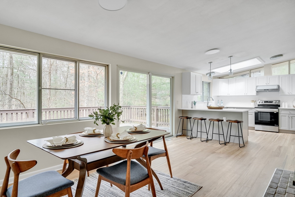 22 Partridge Road Lexington, MA 02420 - Photo 23 of 42 a dining room with furniture and wooden floor