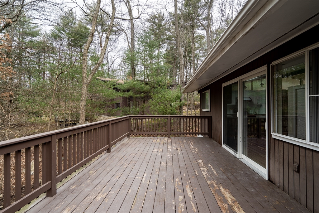 22 Partridge Road Lexington, MA 02420 - Photo 40 of 42 a view of balcony with wooden floor and fence