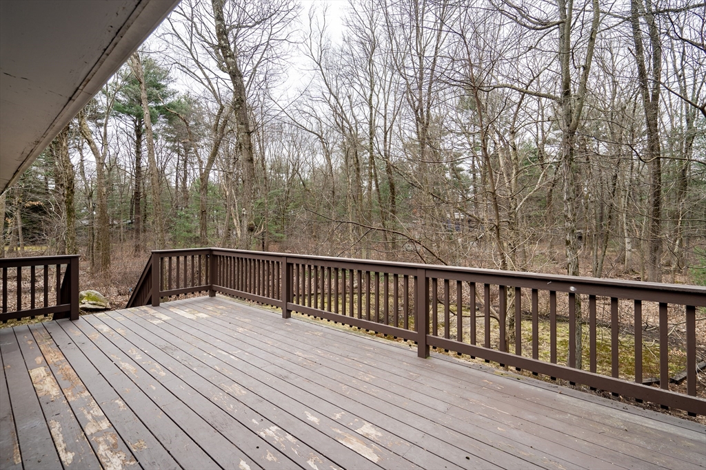22 Partridge Road Lexington, MA 02420 - Photo 41 of 42 a view of balcony with wooden floor and fence