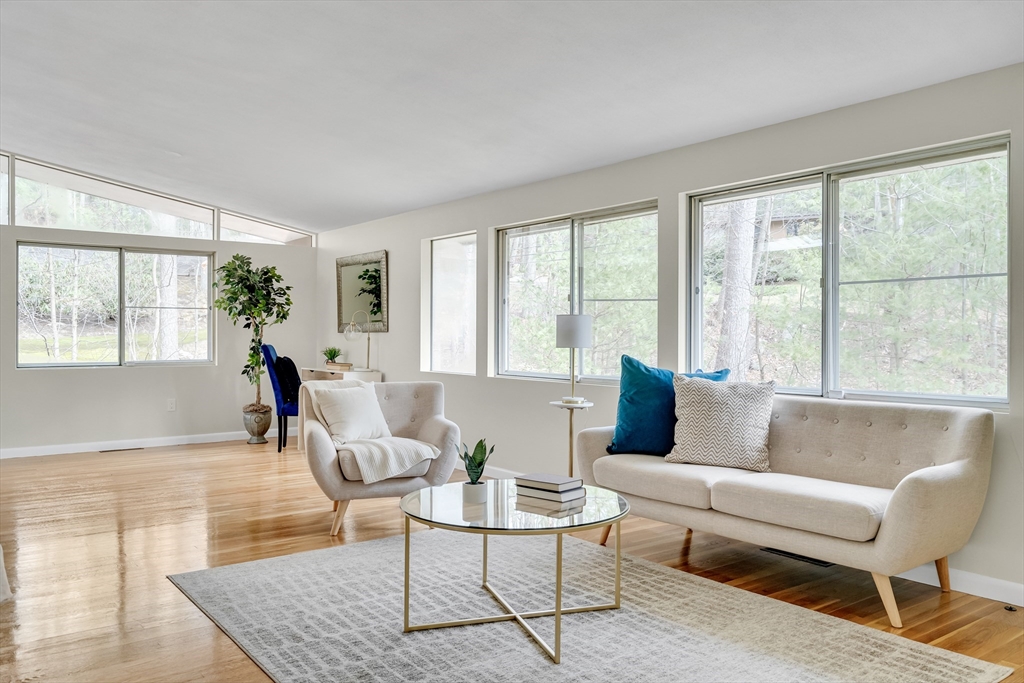 22 Partridge Road Lexington, MA 02420 - Photo 8 of 42 a living room with furniture and a large window