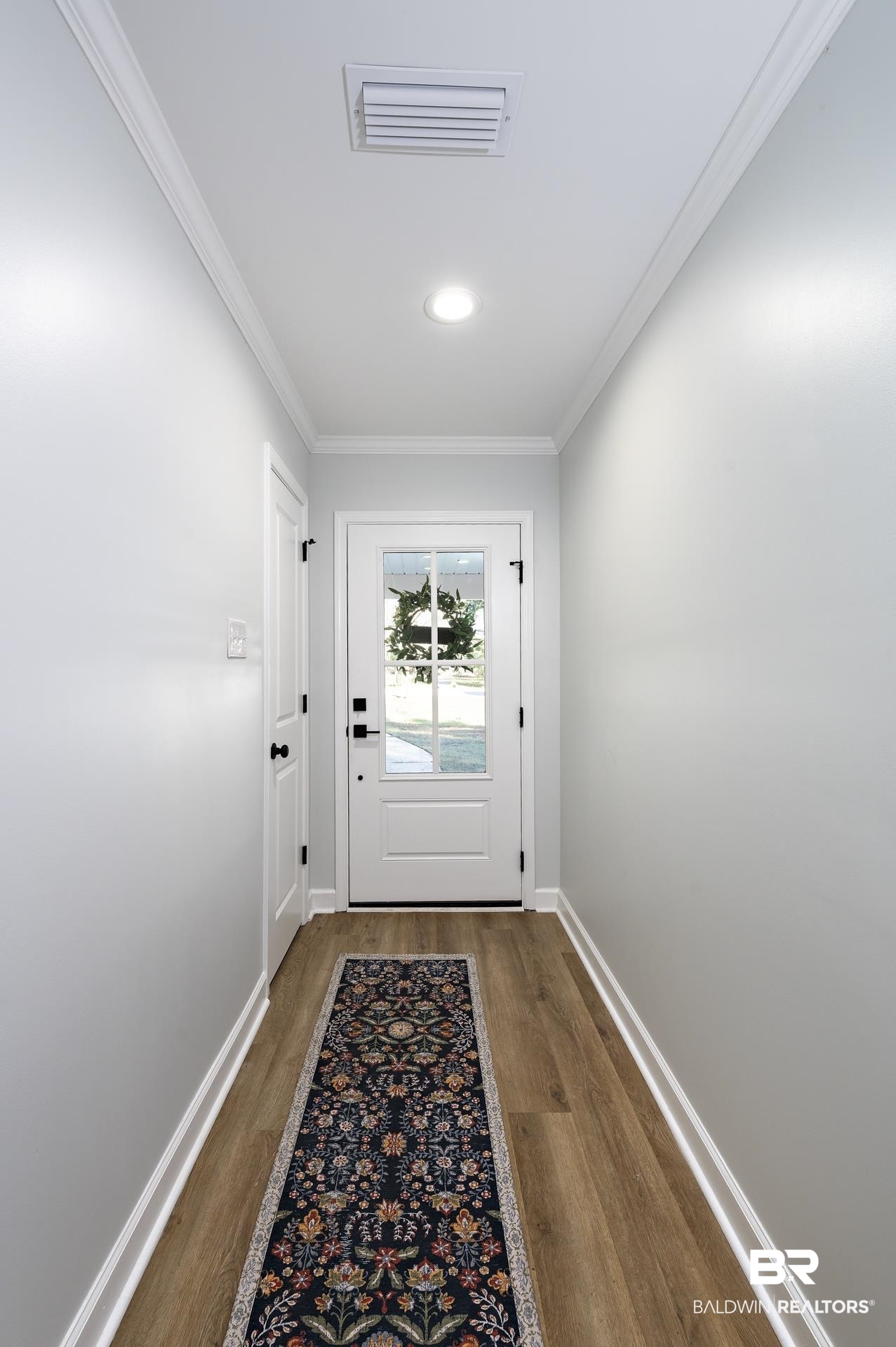 6001 Camp Halls Mill Road Mobile, AL 36619 - Photo 2 of 52 Doorway featuring crown molding, wood finished floors, and recessed lighting