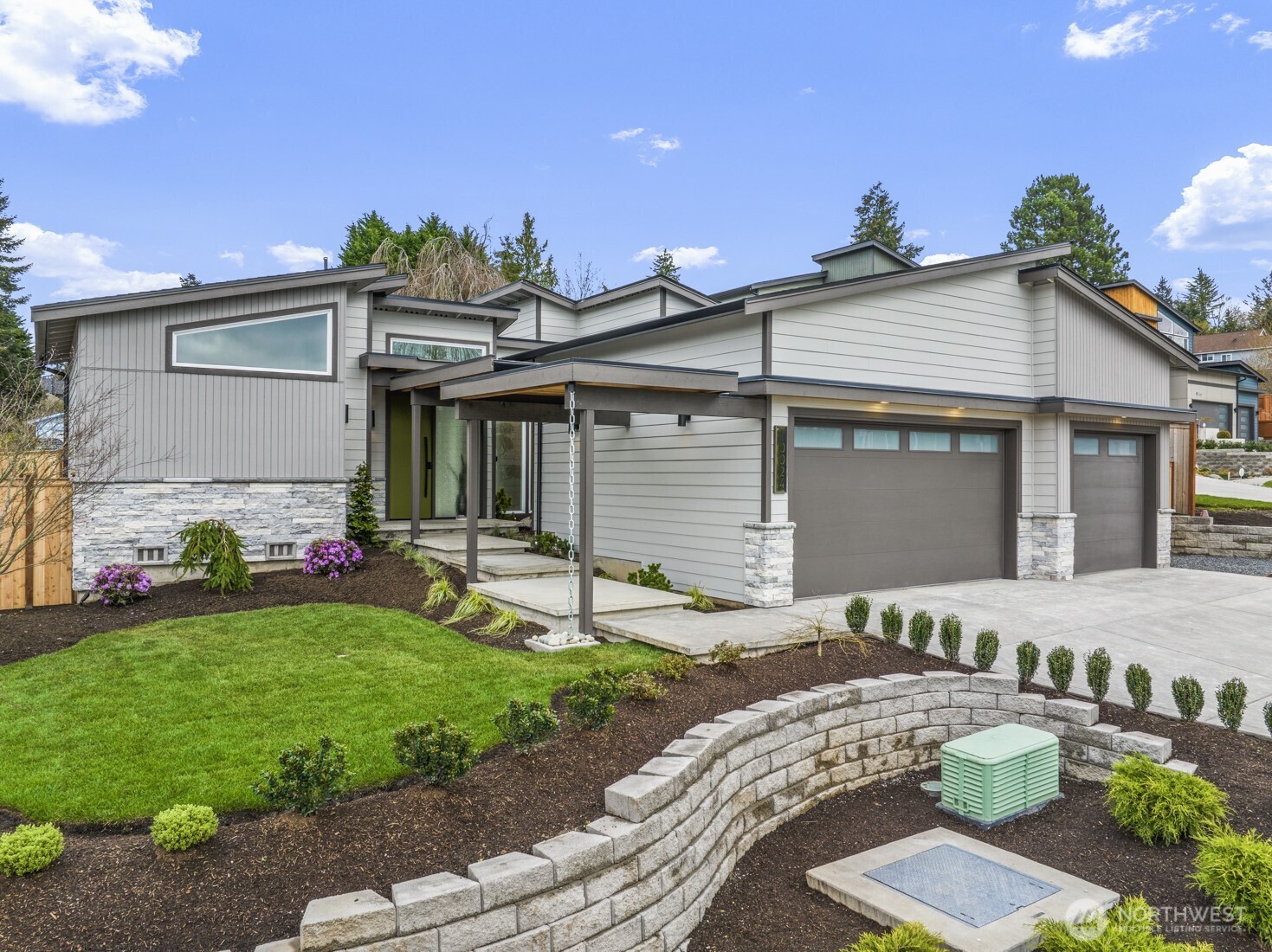 10024 Northeast 196th Place Bothell, WA 98011 - Photo 1 of 40 a front view of house with yard and outdoor seating