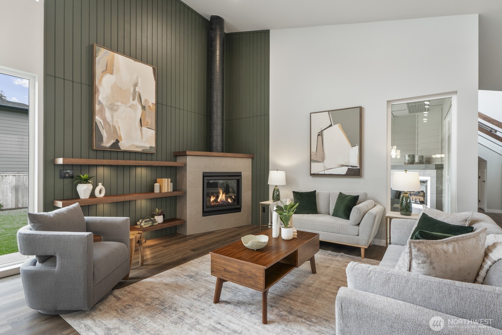 10024 Northeast 196th Place Bothell, WA 98011 - Photo 11 of 40 a living room with furniture and a fireplace