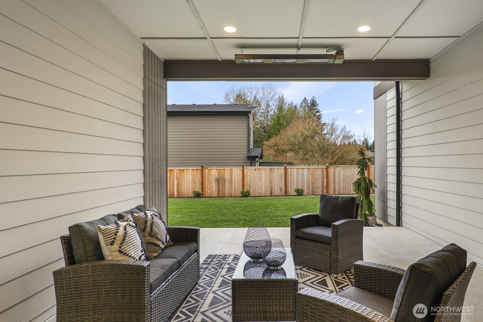 10024 Northeast 196th Place Bothell, WA 98011 - Photo 14 of 40 a outdoor living space with furniture and a garden