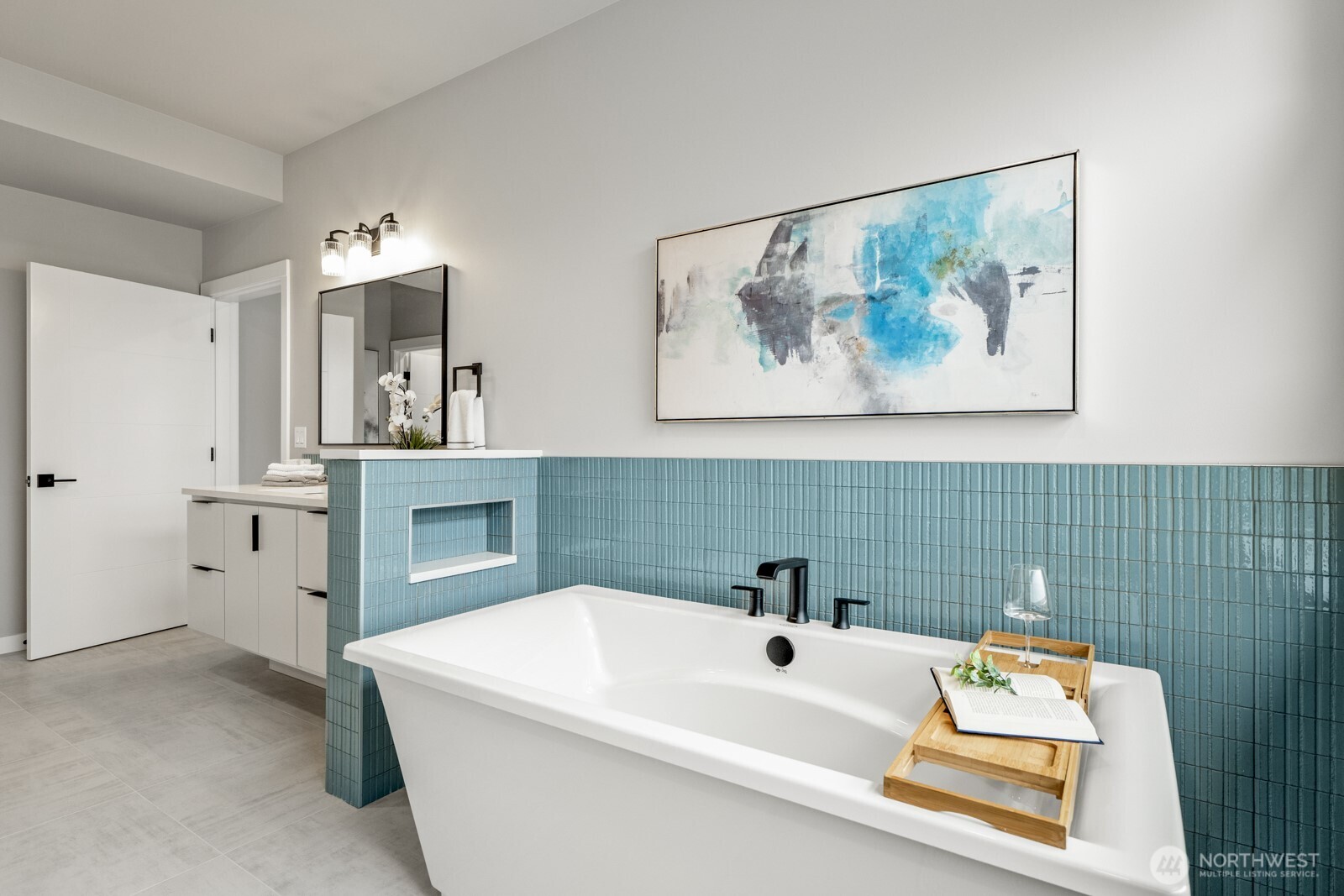 10024 Northeast 196th Place Bothell, WA 98011 - Photo 18 of 40 a bathroom with a tub and sink