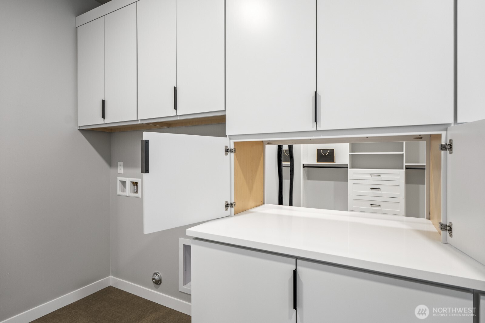 10024 Northeast 196th Place Bothell, WA 98011 - Photo 23 of 40 a kitchen with cabinets and a refrigerator