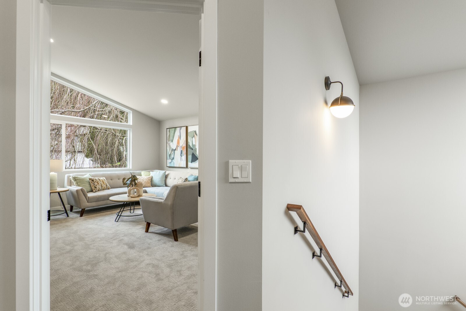 10024 Northeast 196th Place Bothell, WA 98011 - Photo 25 of 40 a living room with furniture and a window